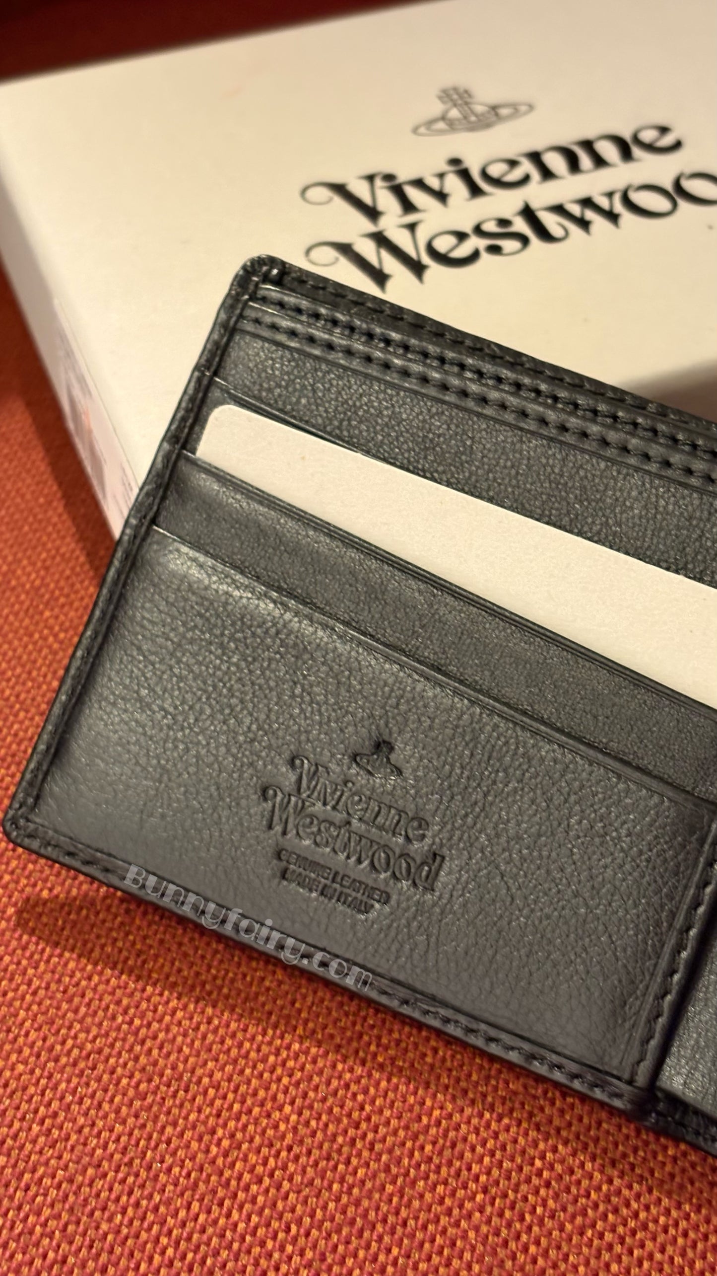 [預購+現貨] Vivienne Westwood 全土星壓紋兩折短夾